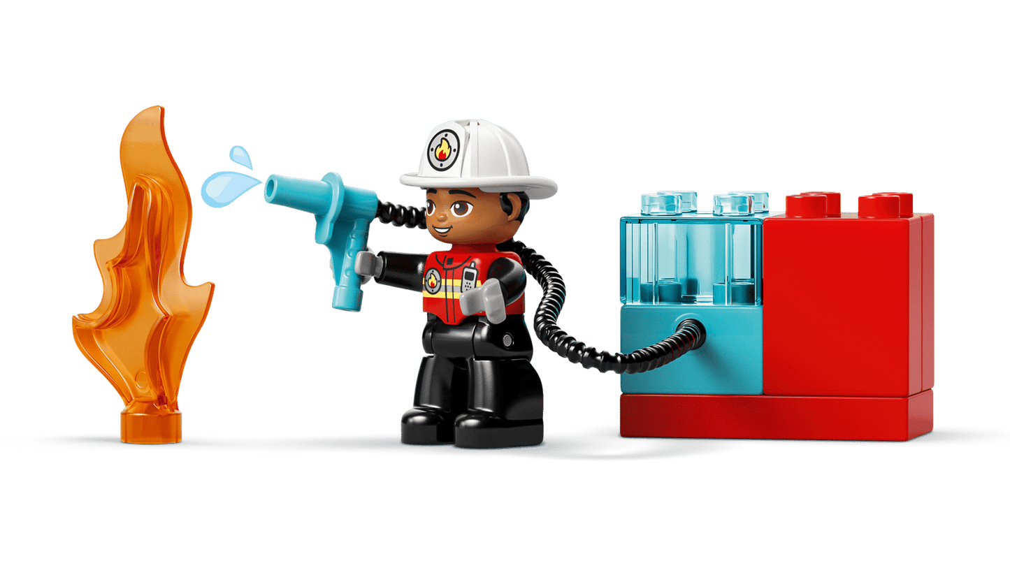 Fire Truck With Hose And Firefighter